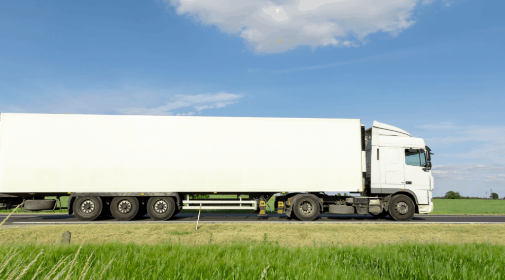 White transport truck on Canadian highway